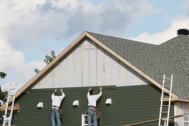 Professional Siding Replacement technician working in District Heights, MD